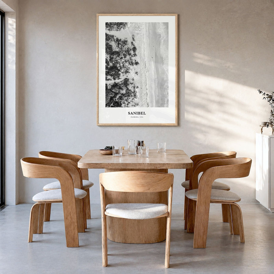 Sanibel Classic Poster in a natural wood frame, hanging in a dining room