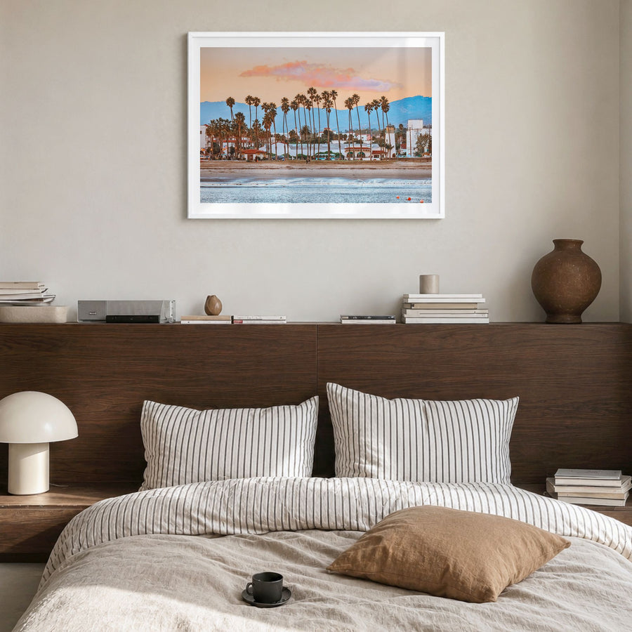 Santa Barbara Photo Poster in a white wood frame, hanging in a bedroom, white border