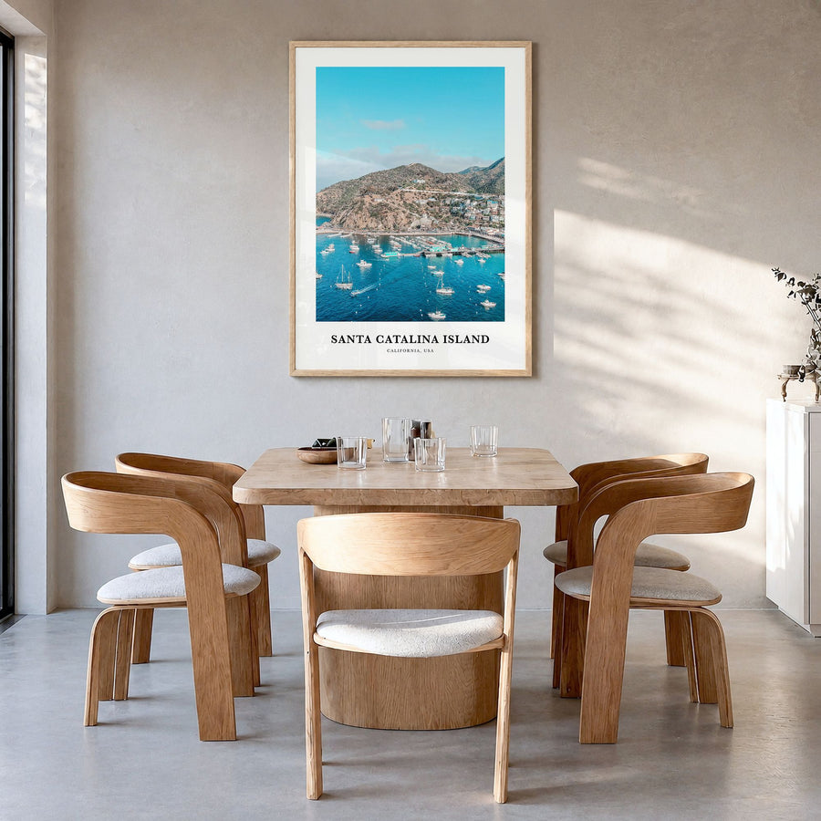 Santa Catalina Island Classic Poster in a natural wood frame, hanging in a dining room