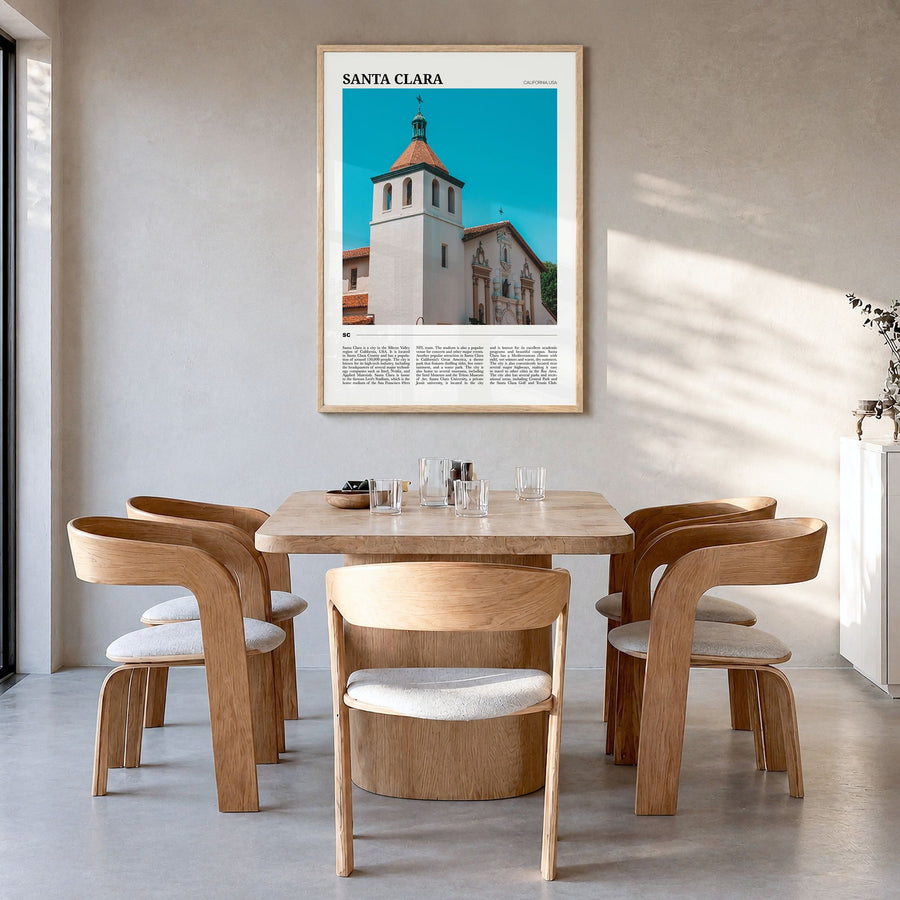 Santa Clara Travel Poster in a natural wood frame, hanging in a dining room