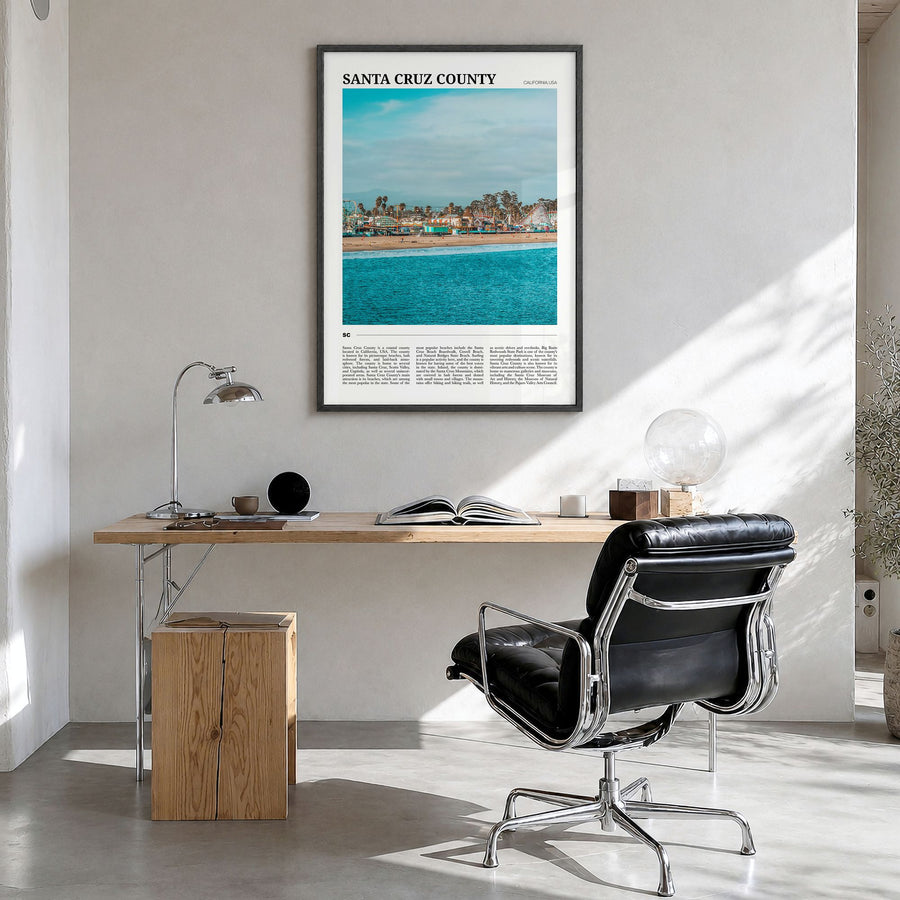 Santa Cruz County Travel Poster in a black wood frame, hanging in a bright home office