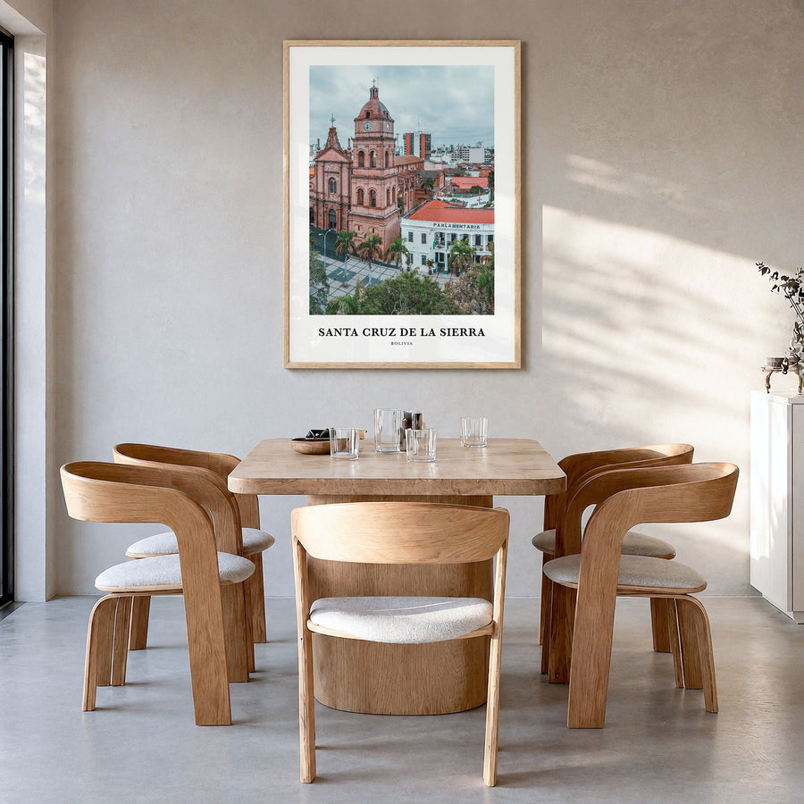 Santa Cruz de la Sierra Classic Poster in a natural wood frame, hanging in a dining room