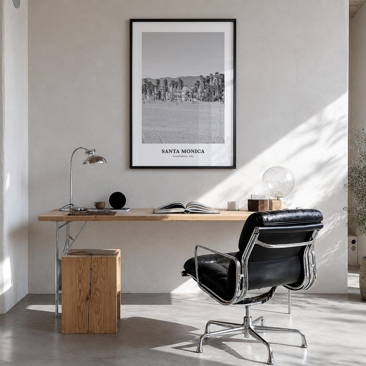 Santa Monica no. 1 black & white classic poster of California, USA – vertical wall art in black wood frame, hanging on wall