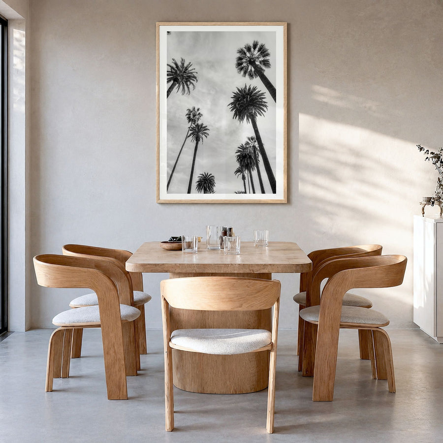 Santa Monica Photo No 1 Poster in a natural wood frame, hanging in a dining room, white border