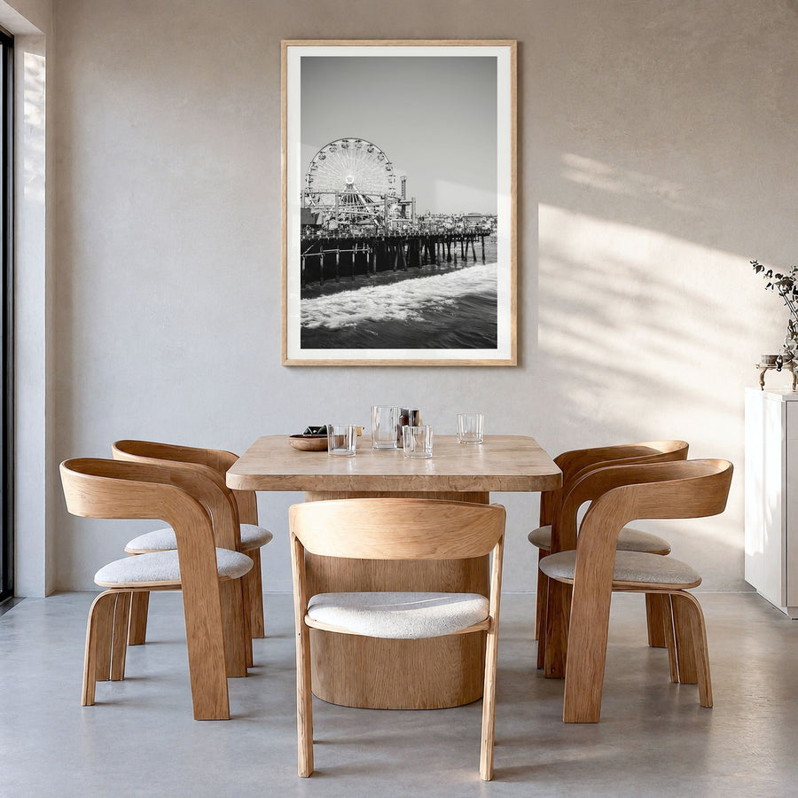 Santa Monica Photo No 2 Poster in a natural wood frame, hanging in a dining room, white border