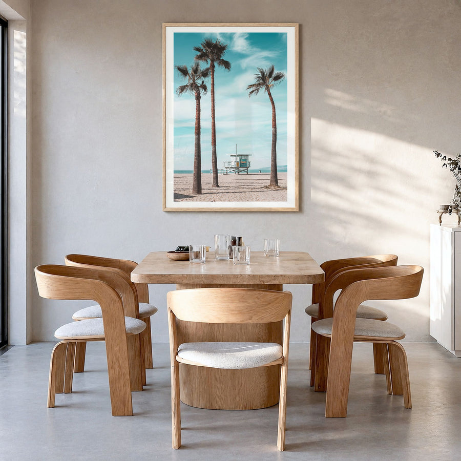 Santa Monica Photo No 3 Poster in a natural wood frame, hanging in a dining room, white border