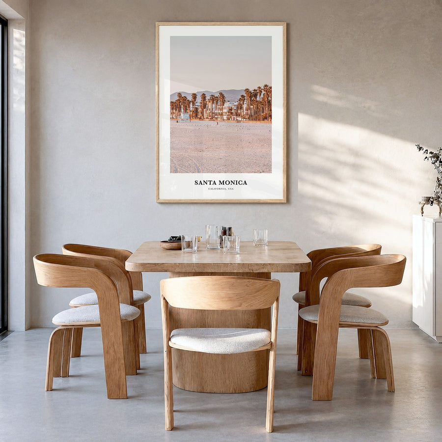 Santa Monica Classic Poster in a natural wood frame, hanging in a dining room
