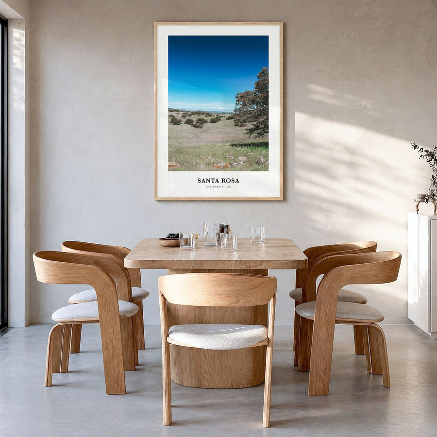 Santa Rosa Classic No 2 Poster in a natural wood frame, hanging in a dining room