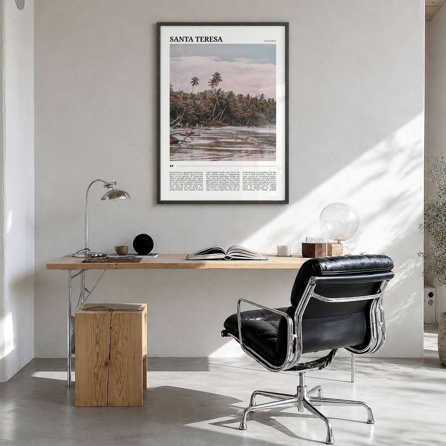 Santa Teresa Travel Poster in a black wood frame, hanging in a bright home office
