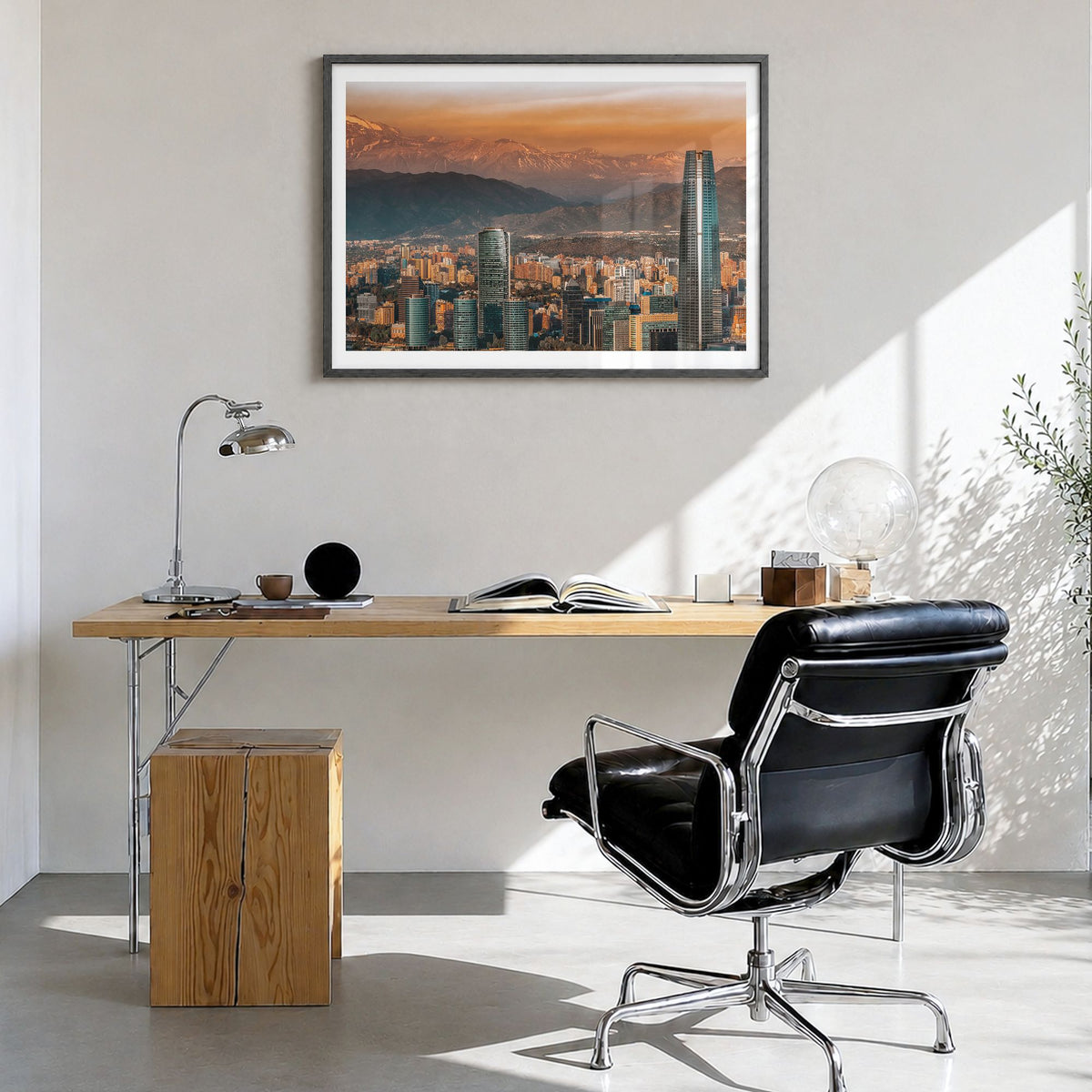 Santiago de Chile Photo Poster in a black wood frame, hanging in a bright home office, white border