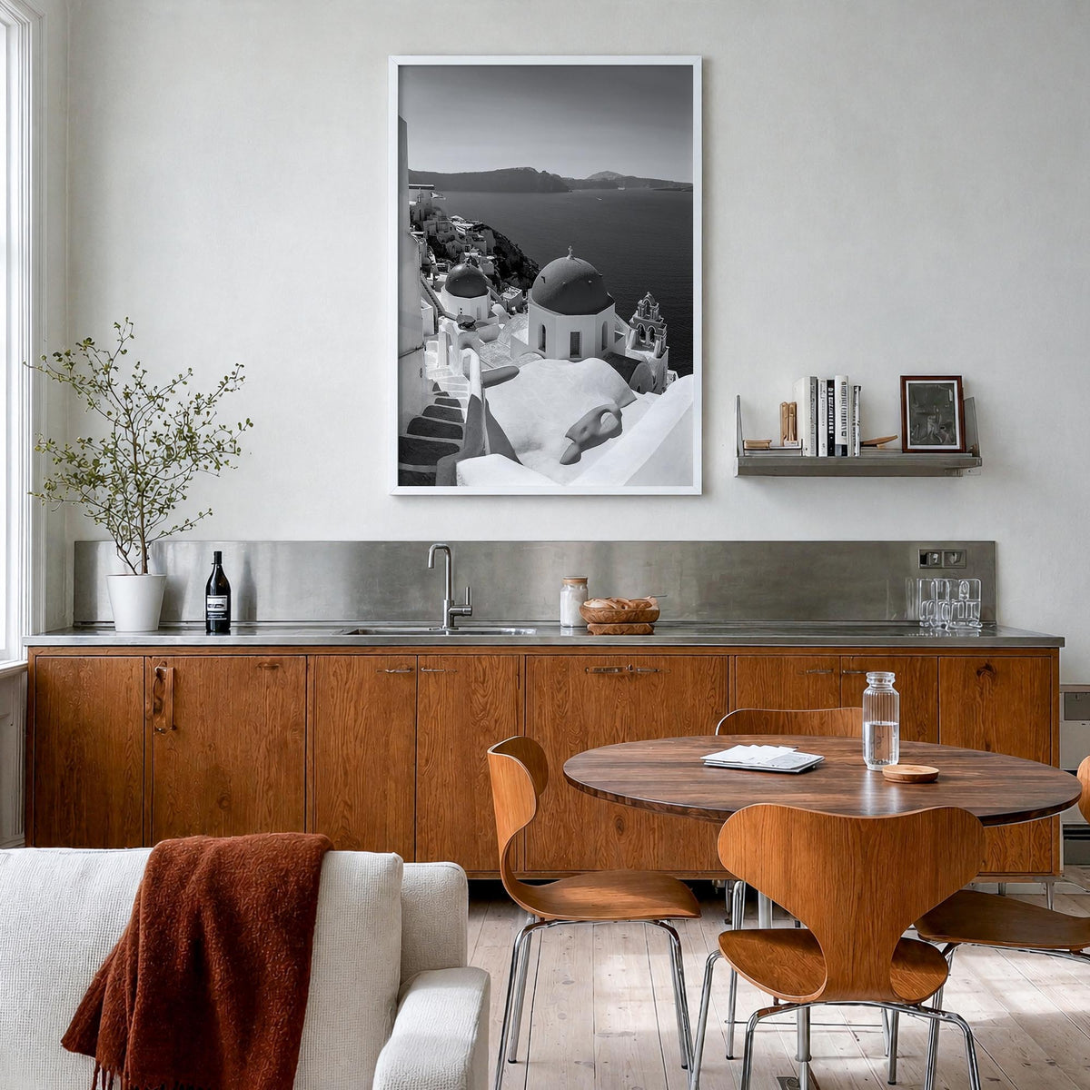 Santorini no. 2 black & white photo poster of Greece – vertical wall art in white wood frame, hanging on wall