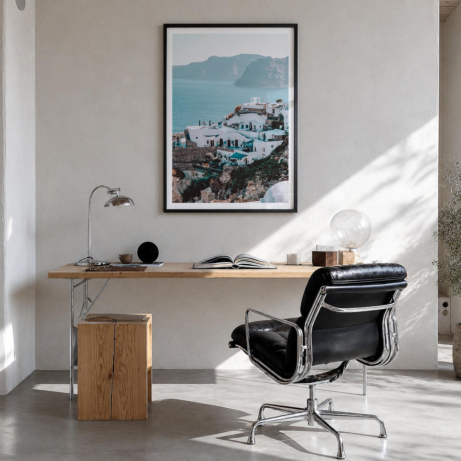 Santorini no. 3 colorful photo poster of Greece – vertical wall art in black wood frame with white border, hanging on wall