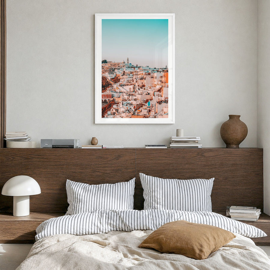 Santorini Photo No 2 Poster in a white wood frame, hanging in a bedroom, white border