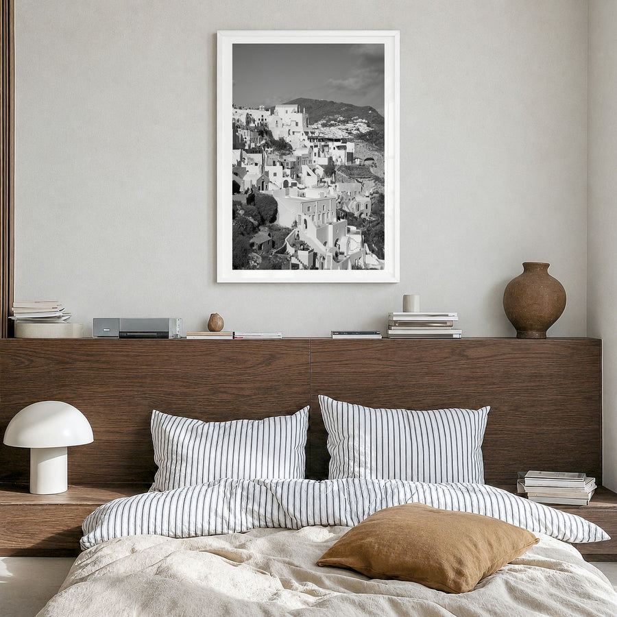 Santorini Photo No 4 Poster in a white wood frame, hanging in a bedroom, white border