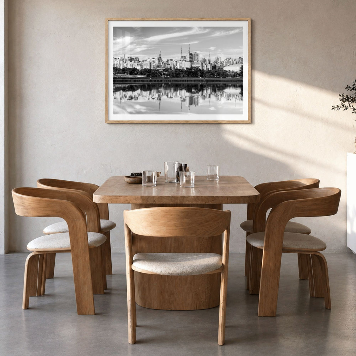 São Paulo Photo Poster in a natural wood frame, hanging in a dining room, white border