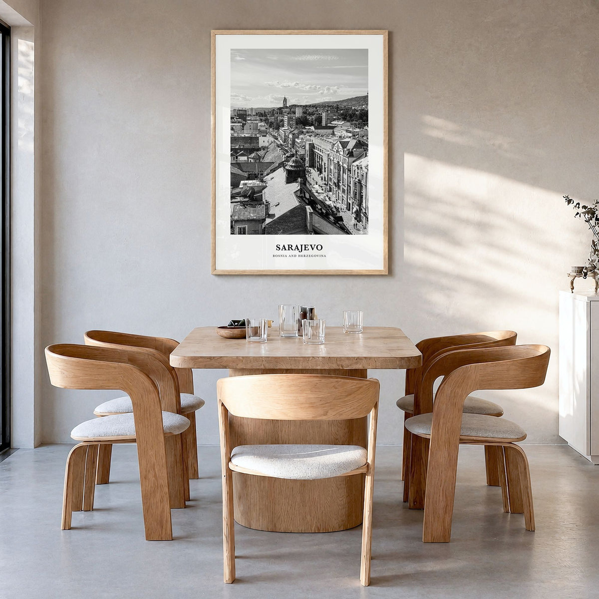 Sarajevo Classic Poster in a natural wood frame, hanging in a dining room