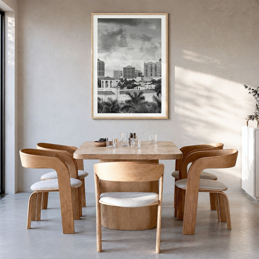 Sarasota Photo Poster in a natural wood frame, hanging in a dining room, white border