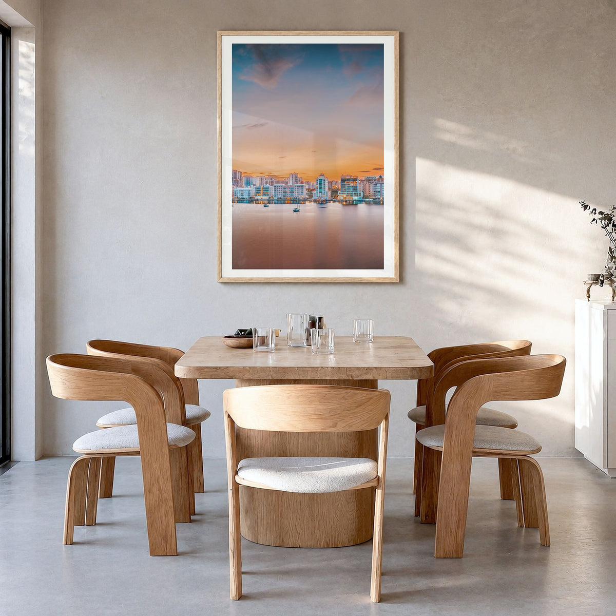 Sarasota Photo No 1 Poster in a natural wood frame, hanging in a dining room, white border