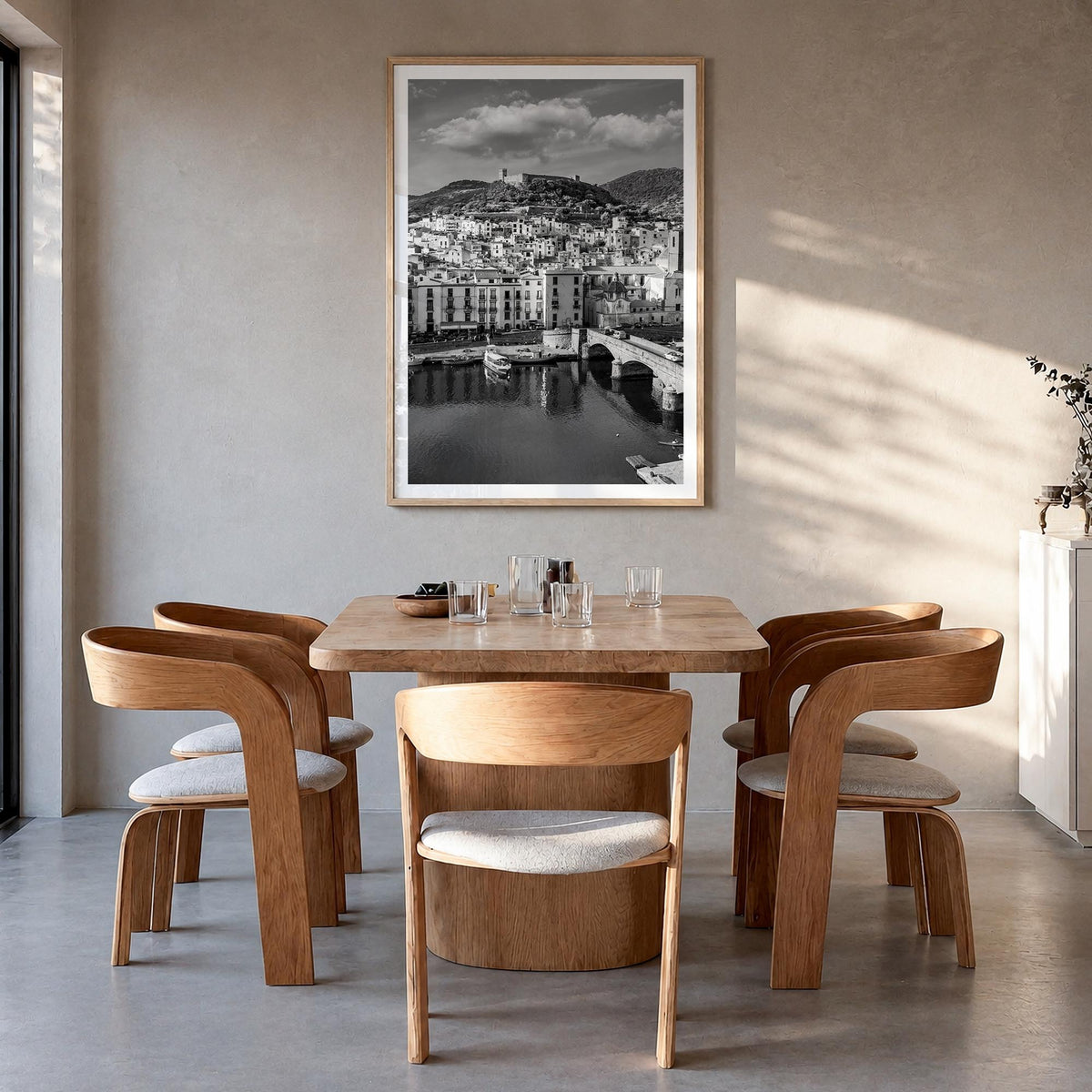 Sardinia black & white photo poster of Italy – vertical wall art in natural wood frame with white border, hanging on wall