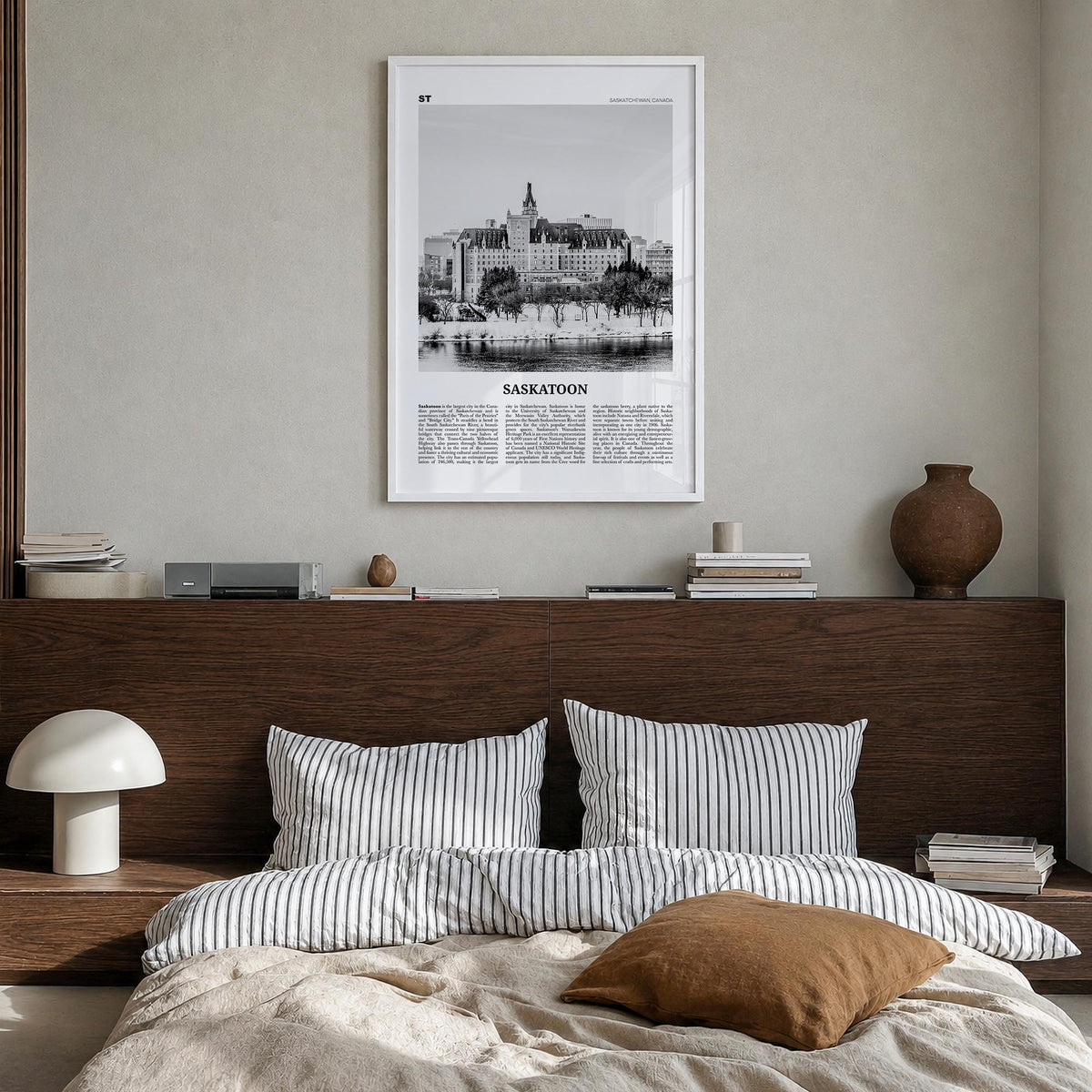 Saskatoon black & white newspaper poster of Saskatchewan, Canada – vertical wall art in white wood frame, hanging on wall