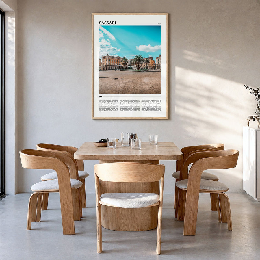 Sassari Travel Poster in a natural wood frame, hanging in a dining room