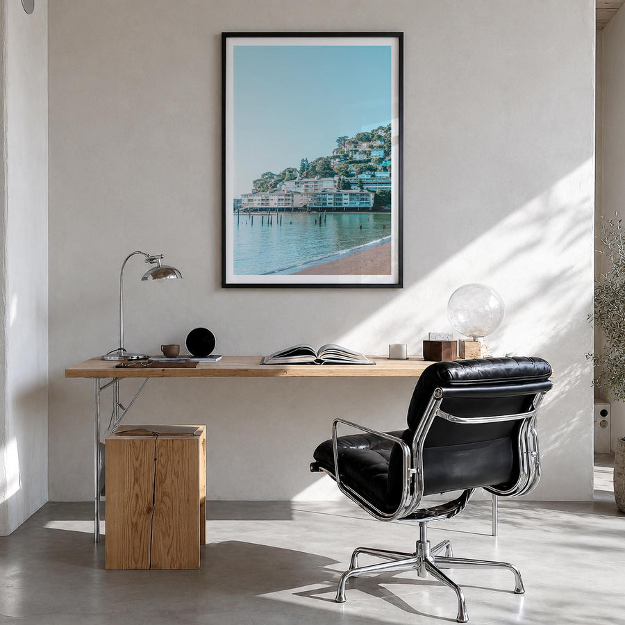 Sausalito colorful photo poster of California, USA – vertical wall art in black wood frame with white border, hanging on wall