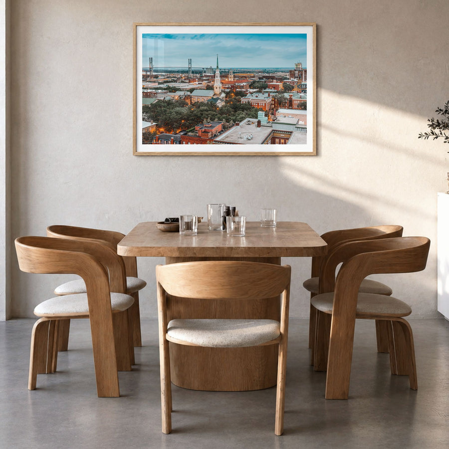 Savannah Photo Poster in a natural wood frame, hanging in a dining room, white border