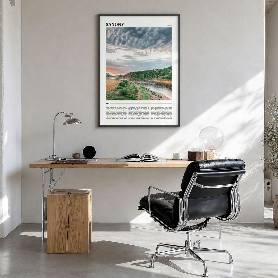 Saxony Travel Poster in a black wood frame, hanging in a bright home office