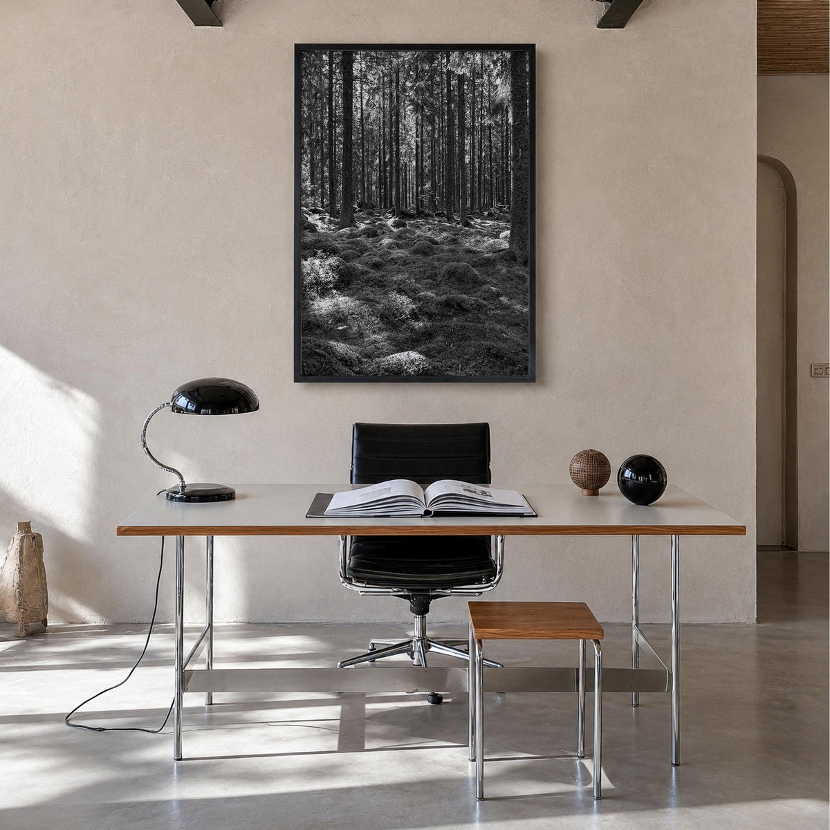 Scandinavian Forest black & white photo poster – vertical wall art in black wood frame, hanging on wall