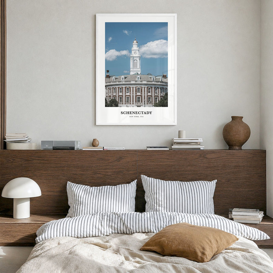 Schenectady Classic Poster in a white wood frame, hanging in a bedroom