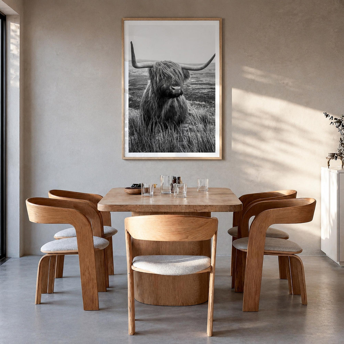 Scottish Highlander no. 1 black & white photo poster – vertical wall art in natural wood frame with white border, hanging on 