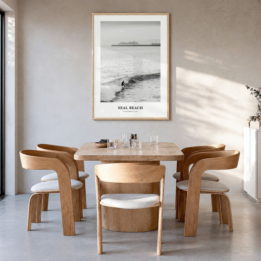 Seal Beach Classic No 2 Poster in a natural wood frame, hanging in a dining room