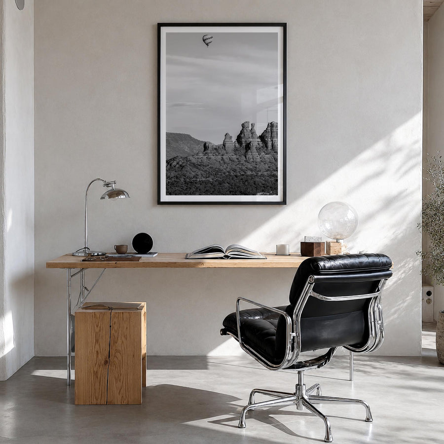 Sedona black & white photo poster of Arizona, USA – vertical wall art in black wood frame with white border, hanging on wall