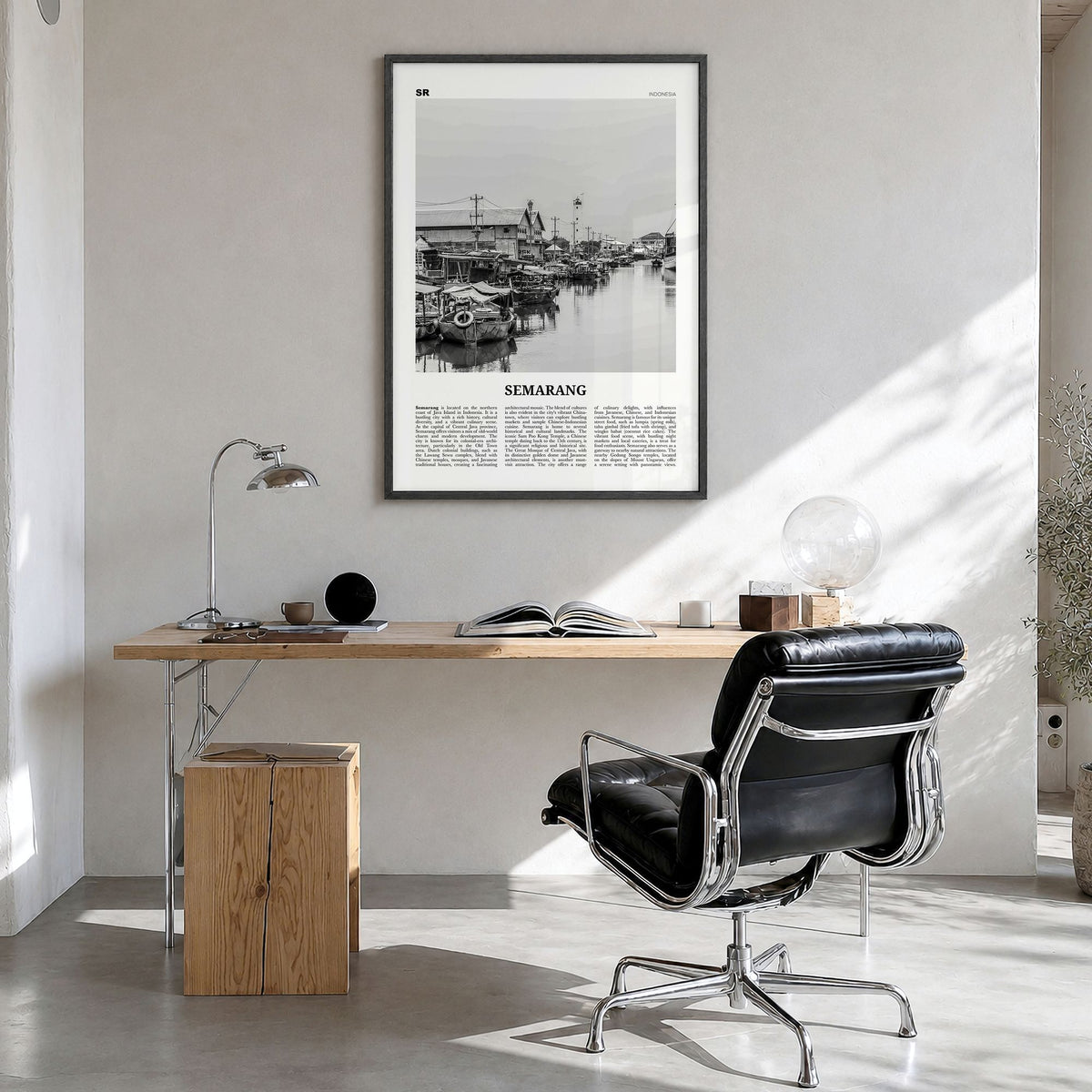 Semarang Newspaper Poster in a black wood frame, hanging in a bright home office