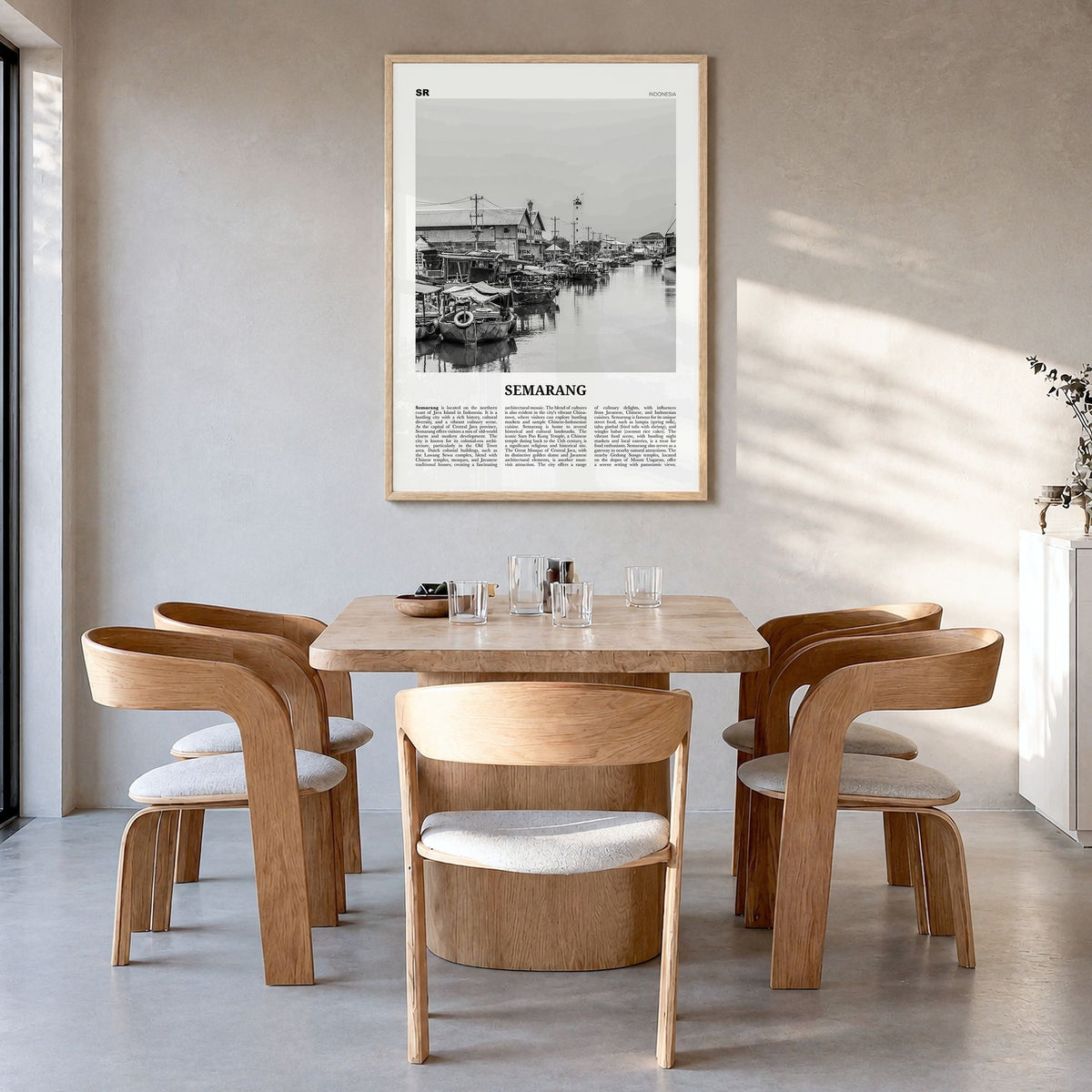 Semarang Newspaper Poster in a natural wood frame, hanging in a dining room