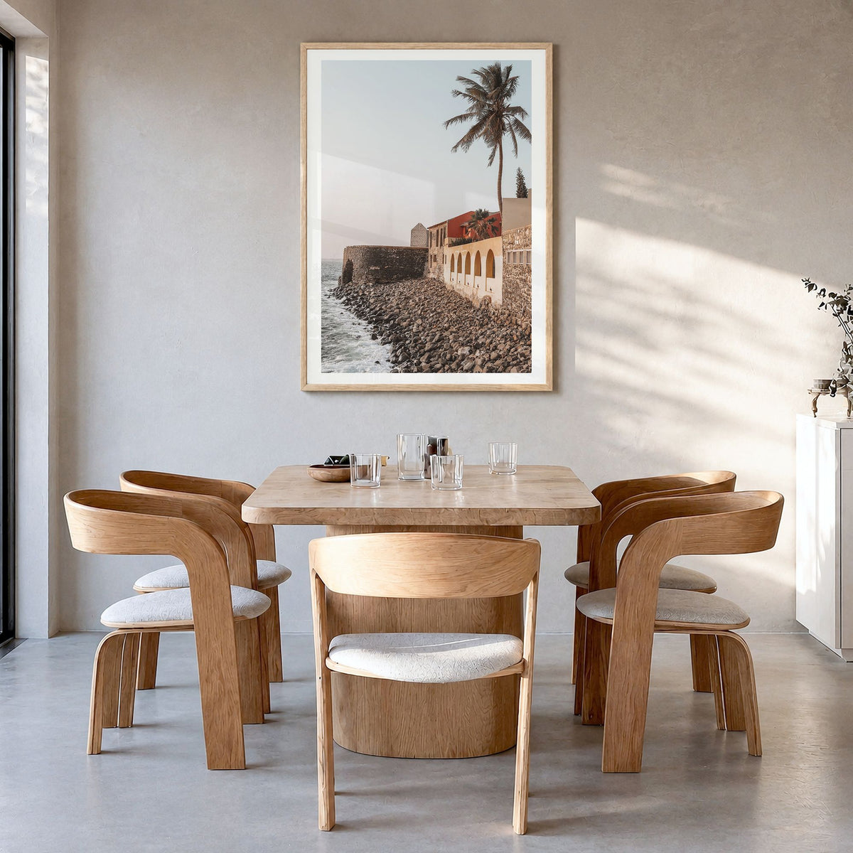 Senegal Photo Poster in a natural wood frame, hanging in a dining room, white border