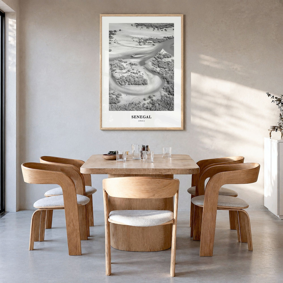 Senegal Classic Poster in a natural wood frame, hanging in a dining room