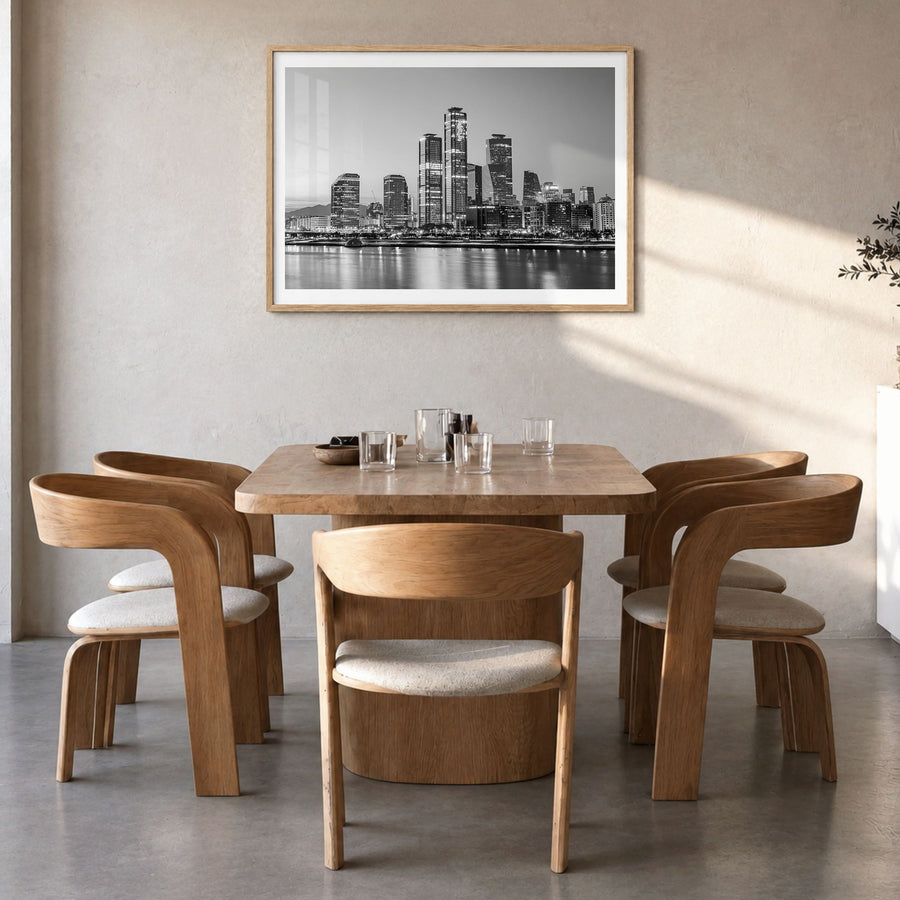 Seoul Photo Poster in a natural wood frame, hanging in a dining room, white border