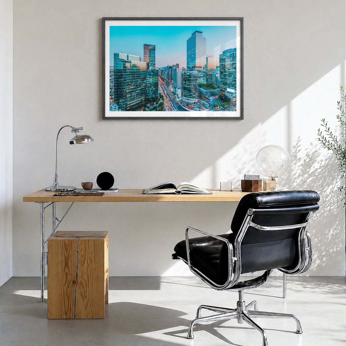 Seoul Photo Poster in a black wood frame, hanging in a bright home office, white border