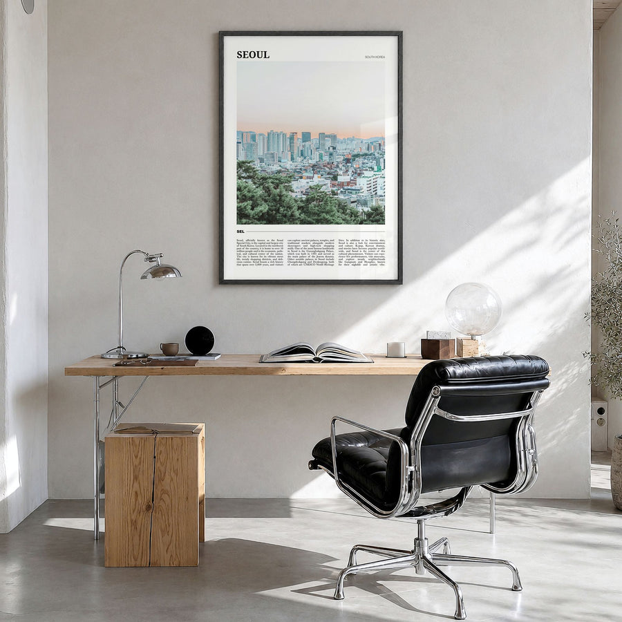 Seoul Travel Poster in a black wood frame, hanging in a bright home office