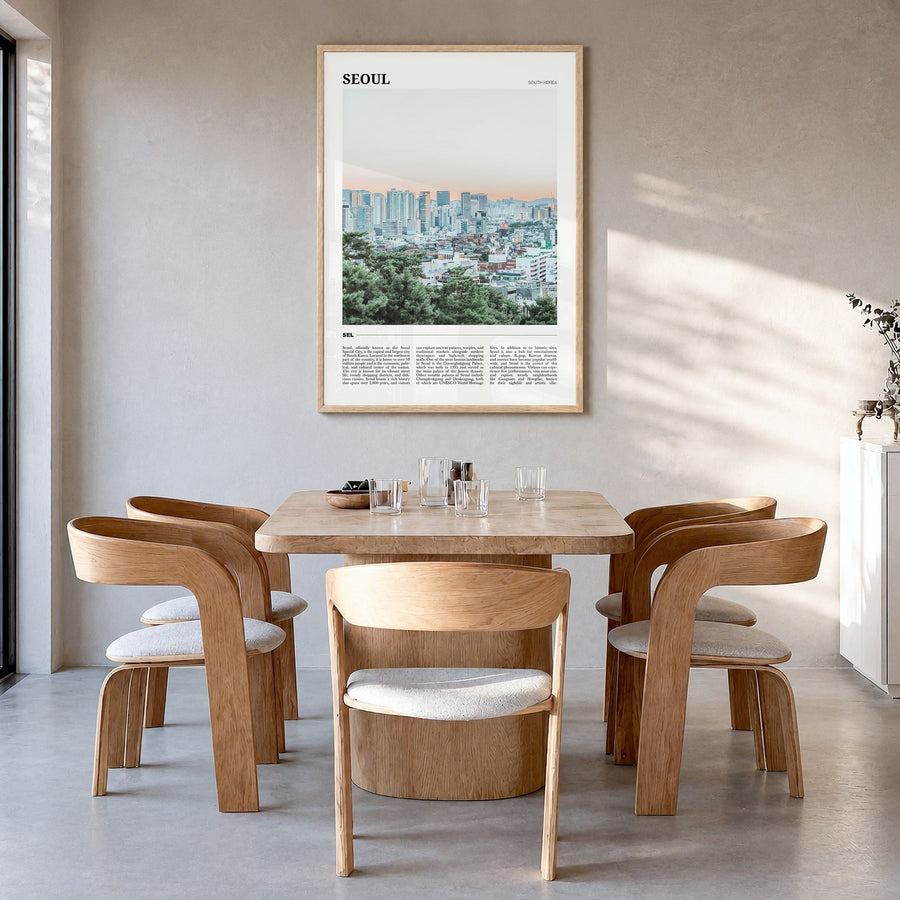 Seoul Travel Poster in a natural wood frame, hanging in a dining room
