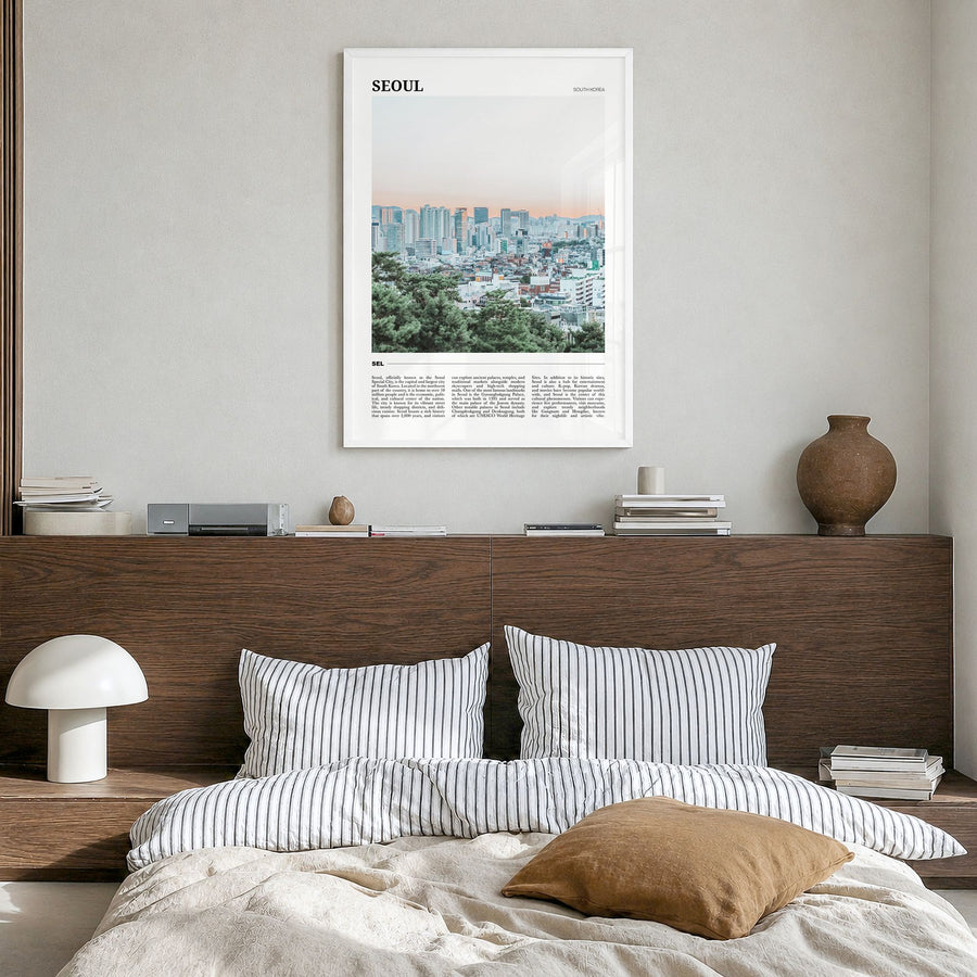 Seoul Travel Poster in a white wood frame, hanging in a bedroom