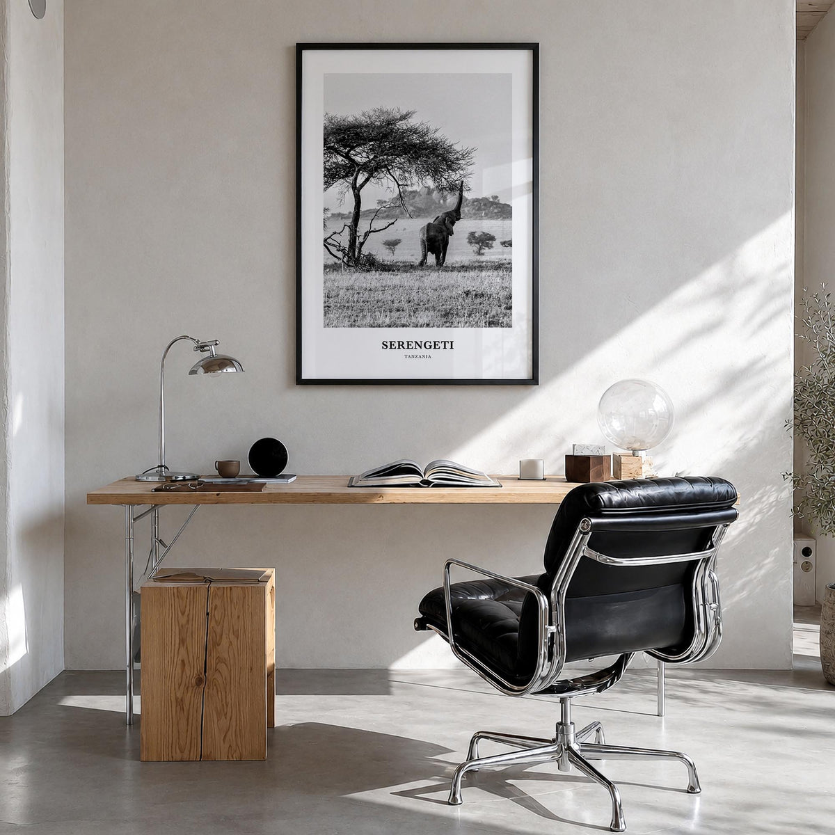 Serengeti National Park black & white classic poster of Tanzania – vertical wall art in black wood frame, hanging on wall