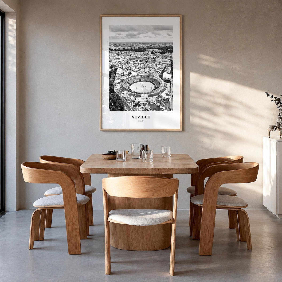 Seville no. 2 black & white classic poster of Spain – vertical wall art in natural wood frame, hanging on wall