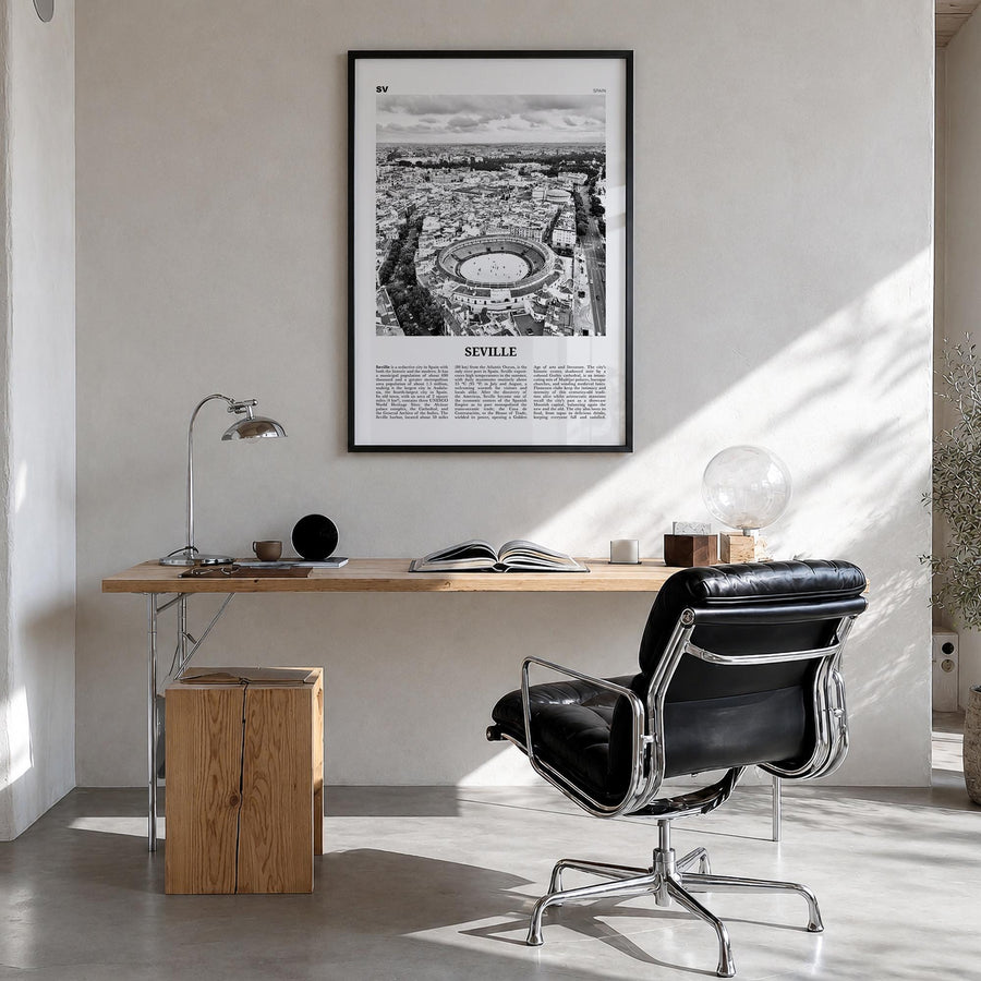 Seville no. 2 black & white newspaper poster of Spain – vertical wall art in black wood frame, hanging on wall