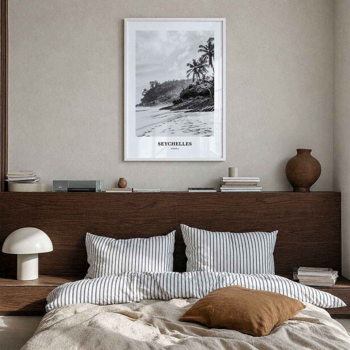 Seychelles black & white classic poster of Africa – vertical wall art in white wood frame, hanging on wall