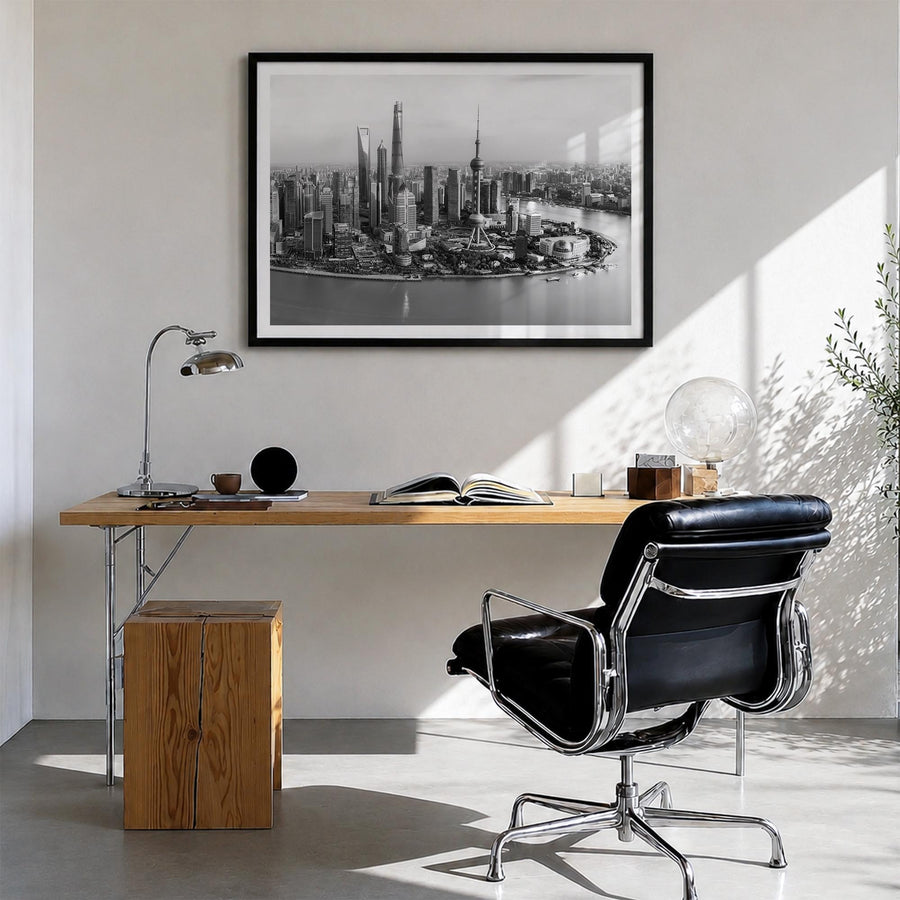 Shanghai black & white photo poster of China – horizontal wall art in black wood frame with white border, hanging on wall