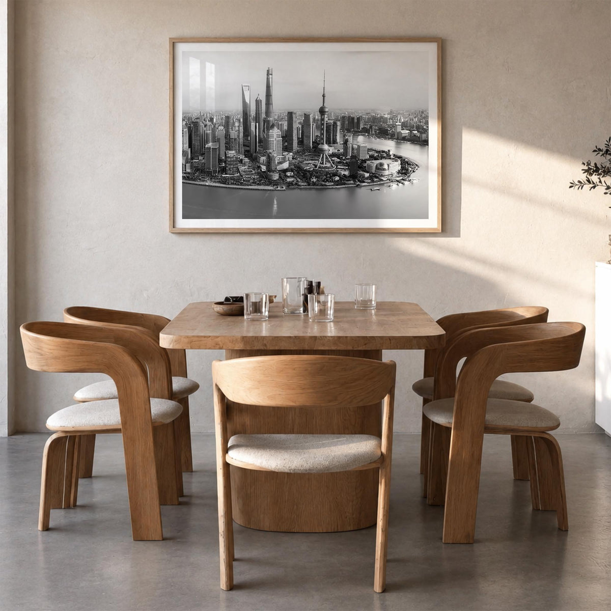 Shanghai black & white photo poster of China – horizontal wall art in natural wood frame with white border, hanging on wall