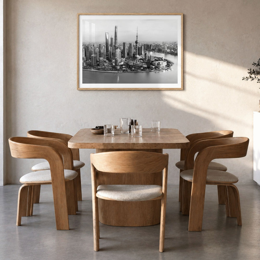 Shanghai Photo Poster in a natural wood frame, hanging in a dining room, white border