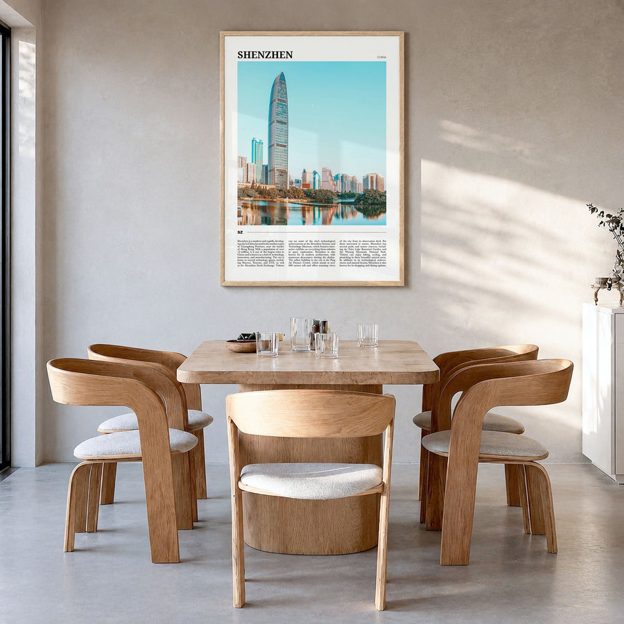 Shenzhen Travel Poster in a natural wood frame, hanging in a dining room